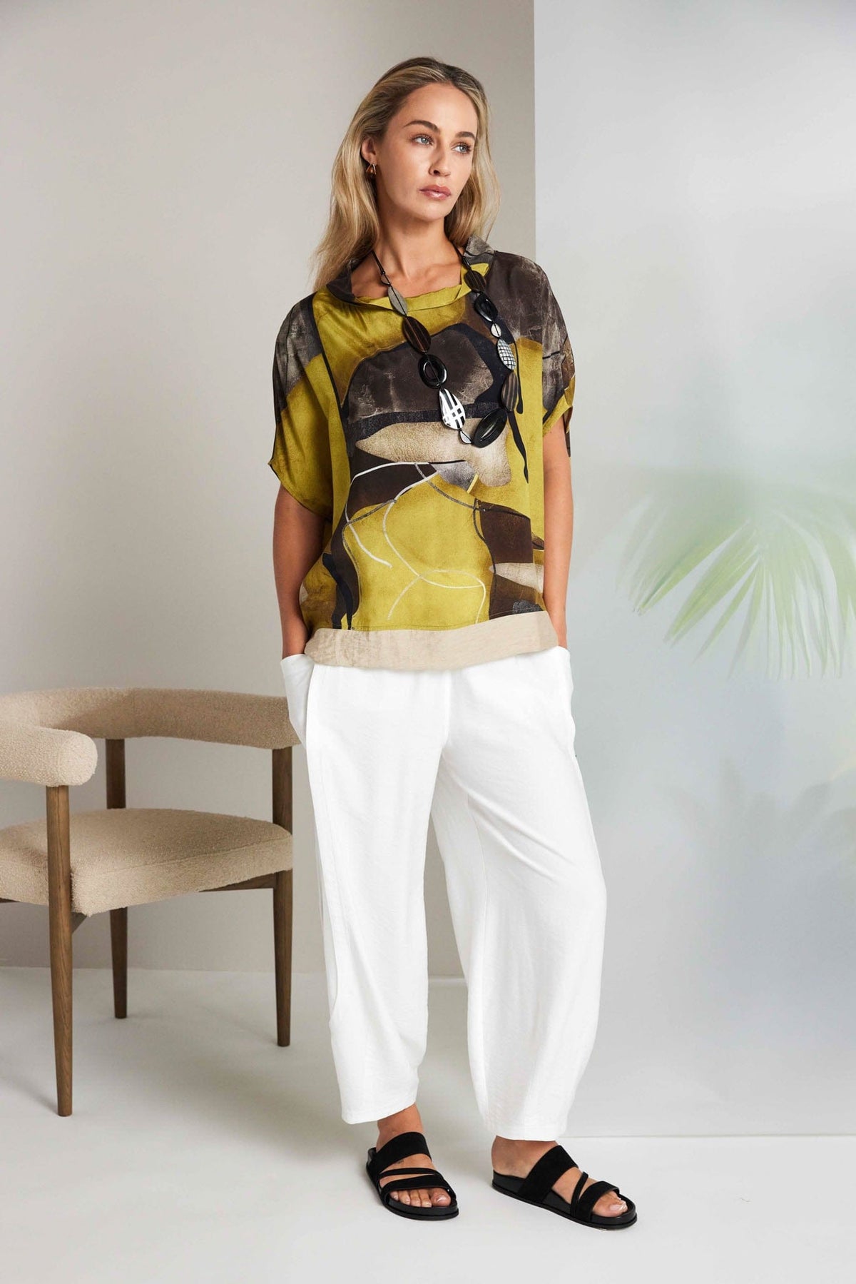 NAYA Dipped Hem Blouse