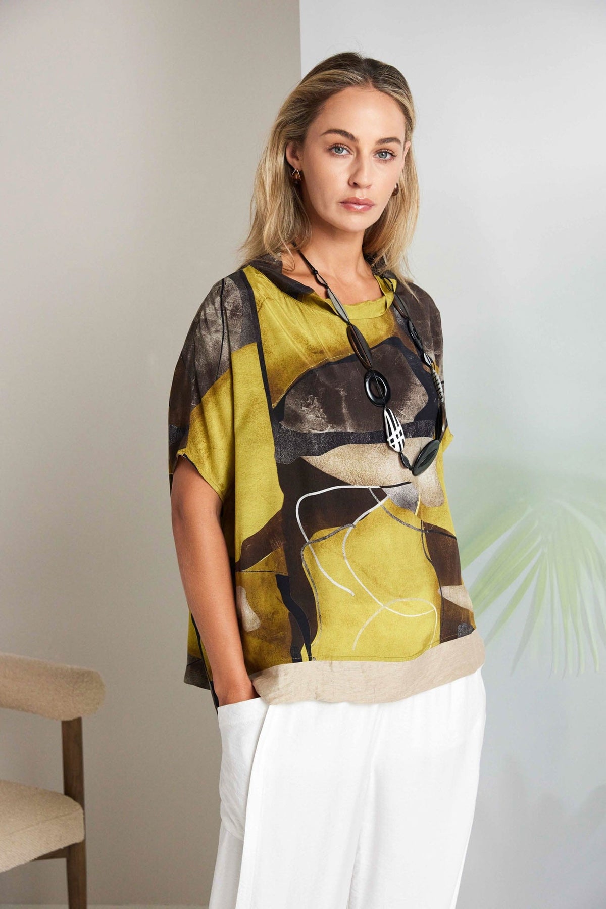 NAYA Dipped Hem Blouse